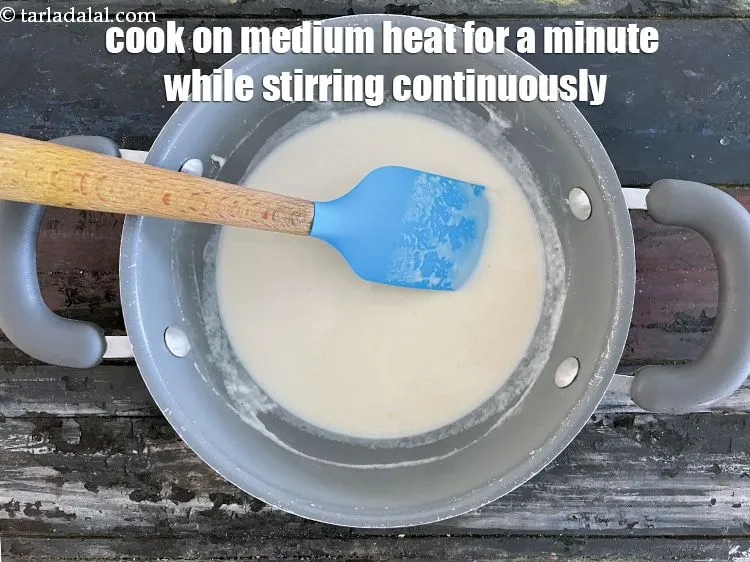 Step 20 – Cook on a medium flame for 1 minute or till no lumps remain, while stirring …