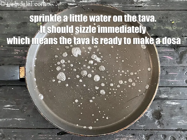 Step 20 – Sprinkle a little water on the tava.&nbsp;It should sizzle immediately. Never use a roti/paratha tava …