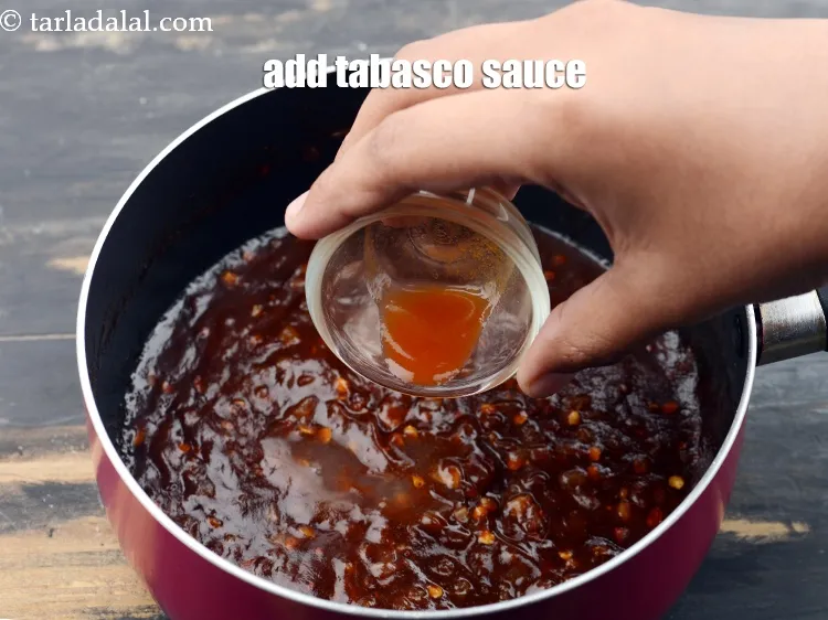 Step 20 – Add&nbsp;1&nbsp;tsp-&nbsp;<a href="https://www.tarladalal.com/glossary-tabasco-sauce-629i">tabasco sauce</a>.