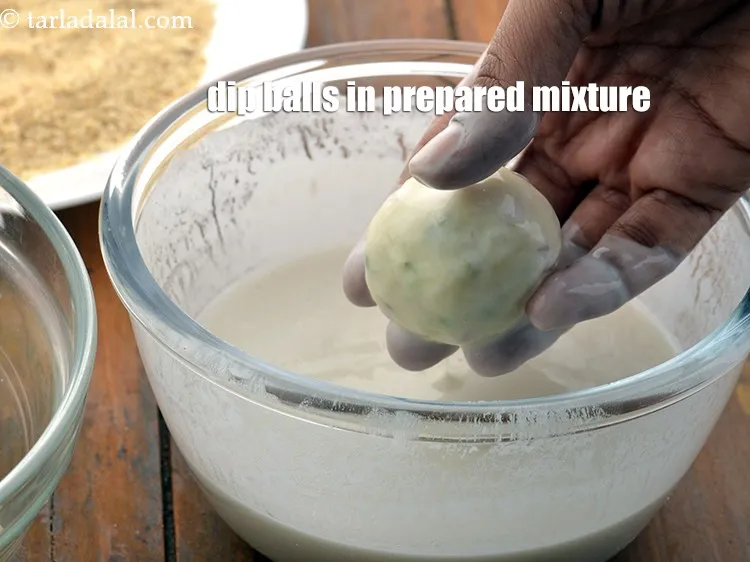 Step 19 – Dip the balls in the prepared plain flour-water mixture.