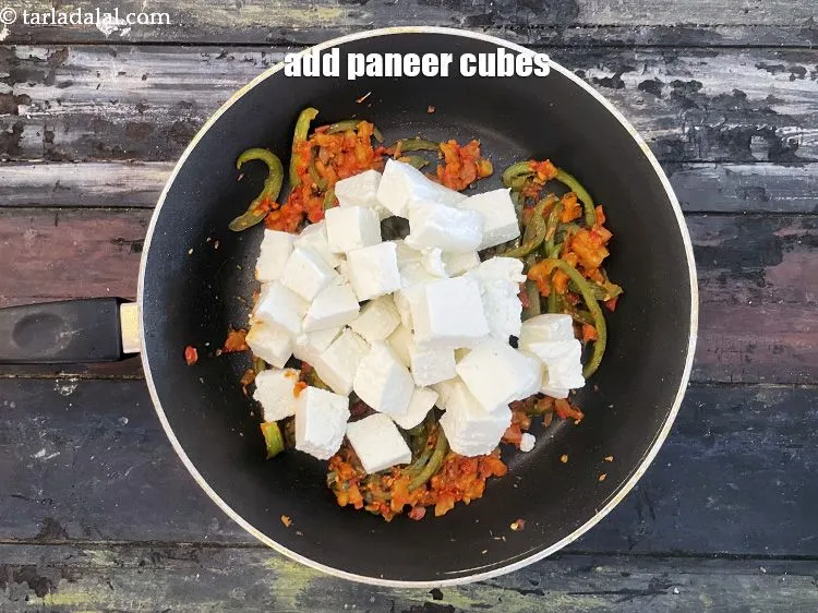Step 26 – Add&nbsp;<meta charset="UTF-8" />2 cups&nbsp;<a href="glossary-paneer-cubes-cottage-cheese-cubes-1002i">paneer (cottage cheese) cubes</a>.
