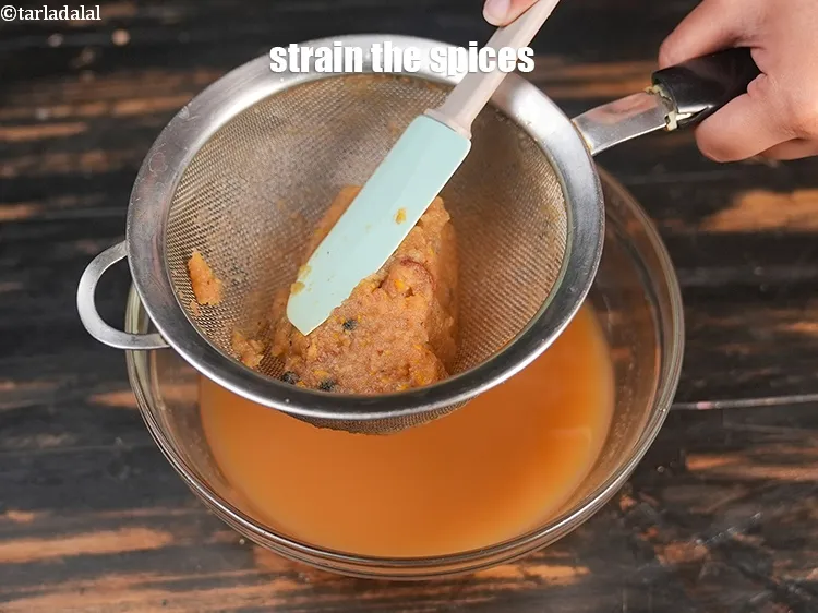 Step 29 – Strain the spices.