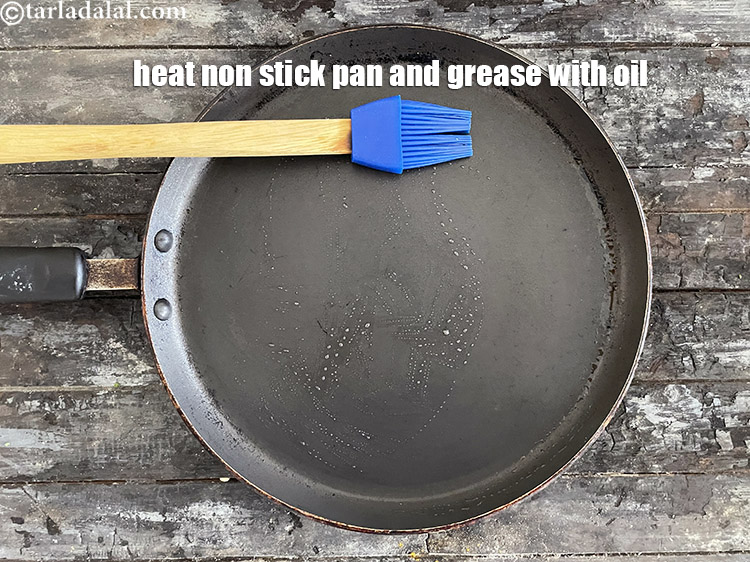 स्टेप 23 – एक नॉन-स्टिक तवा तेज़ आँच पर गरम करें और इसे …