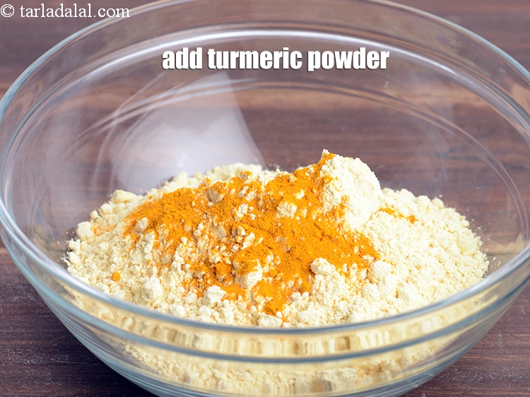 Step 21 – Add &frac12; tsp <a href="https://www.tarladalal.com/glossary-turmeric-powder-haldi-645i">turmeric powder (haldi)</a>.