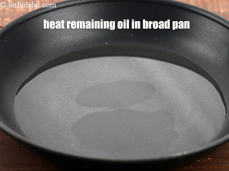 Step 20 – Heat the remaining 2 tbsp of oil in a broad non-stick pan.