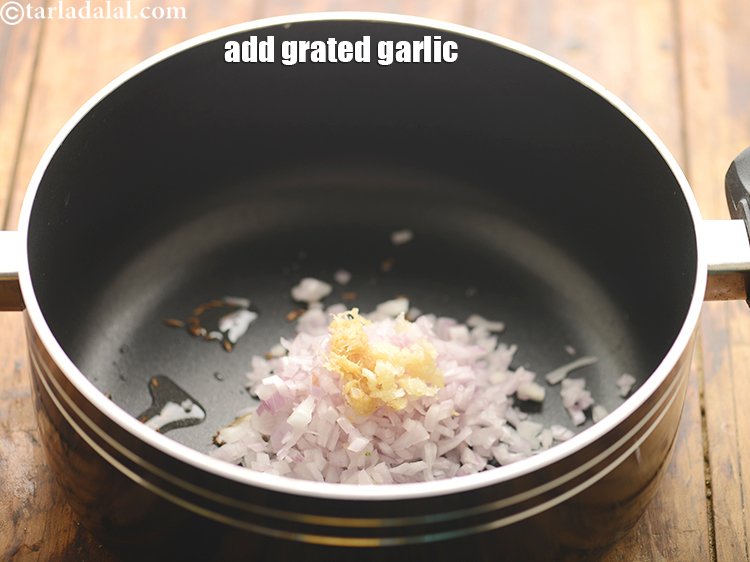 Step 34 – Add grated garlic. You can substitute it with <a href="https://www.tarladalal.com/ginger--garlic-paste--popular-restaurant-recipes--33530r" target="_blank"><strong>ginger-garlic paste</strong></a> if you wish …