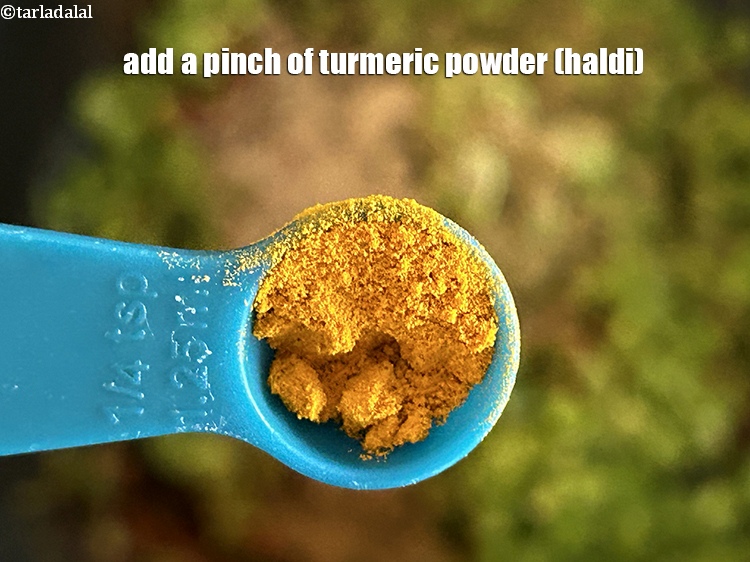 Step 20 – Add&nbsp;<meta charset="UTF-8" />a pinch of&nbsp;<a href="glossary-turmeric-powder-haldi-645i">turmeric powder (haldi)</a>.&nbsp;