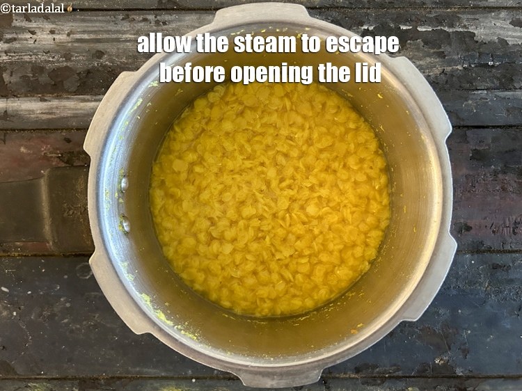 Step 21 – Allow the steam to escape before opening the lid.