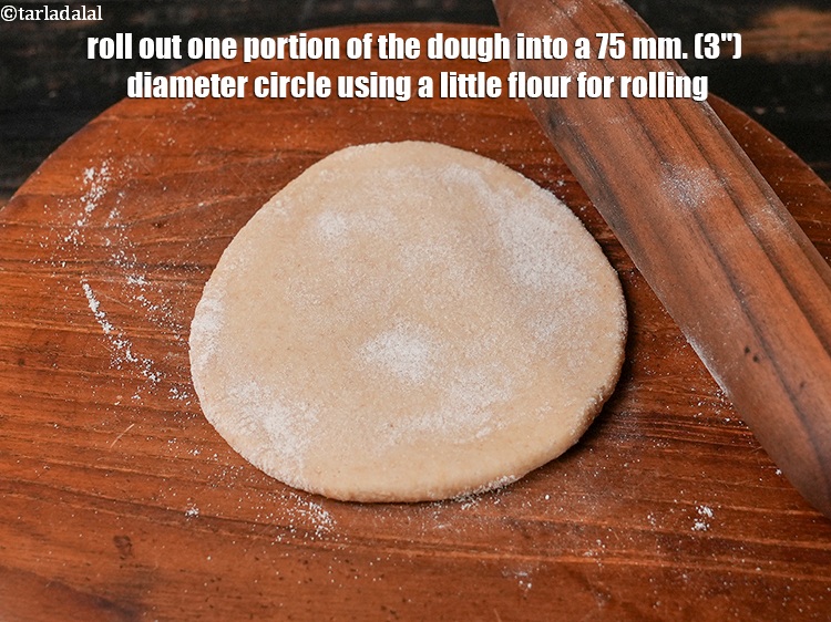 Step 32 – Roll out one portion of the dough into a 75 mm. (3&quot;) diameter circle using …