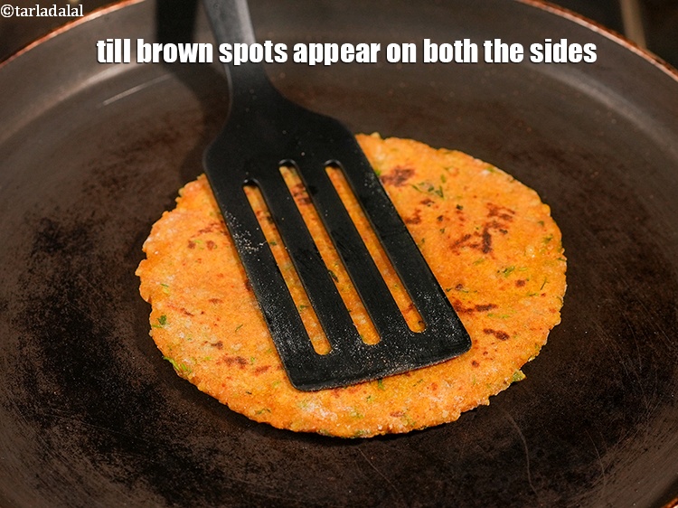 Step 24 – Till brown spots appear on both the sides.