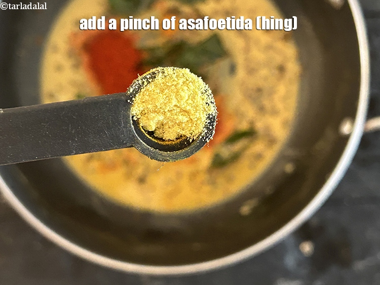 Step 20 – Add&nbsp;<meta charset="UTF-8" />a pinch of&nbsp;<a href="glossary-asafoetida-hing-113i">asafoetida (hing)</a>.