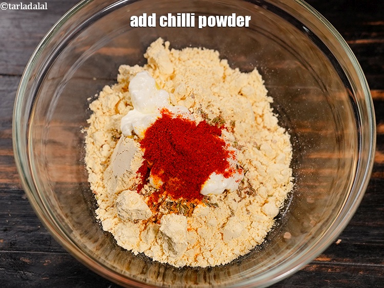 Step 20 – Add &frac12; tsp <a href="https://www.tarladalal.com/glossary-chilli-powder-red-chilli-powder-339i">chilli powder</a>.&nbsp;
