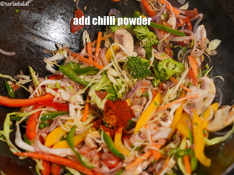 Step 23 – Add 1 tsp <a href="https://www.tarladalal.com/glossary-chilli-powder-red-chilli-powder-339i">chilli powder</a>.