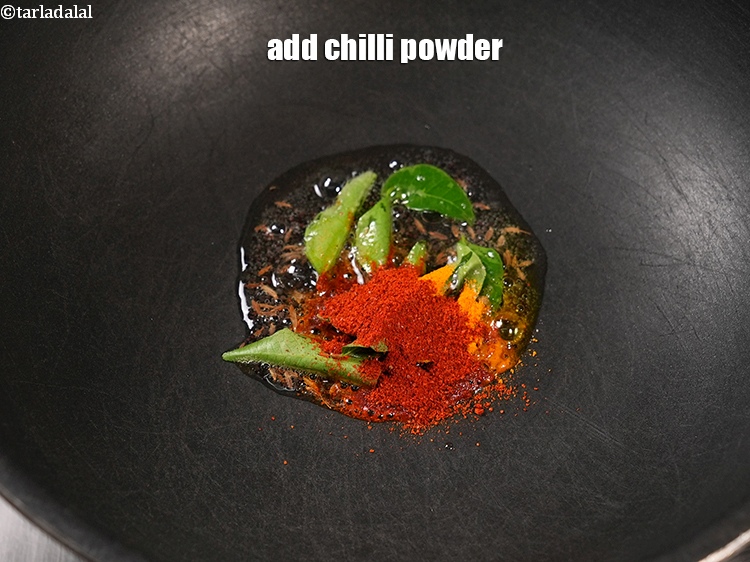 Step 20 – Add &frac14; tsp <a href="https://www.tarladalal.com/glossary-chilli-powder-red-chilli-powder-339i">chilli powder</a>.&nbsp;