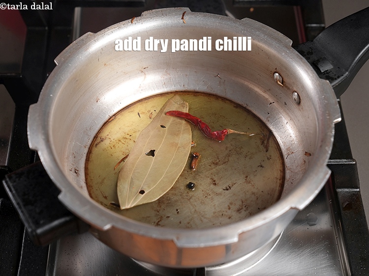 Step 20 – Add 1 dry pandi chili.