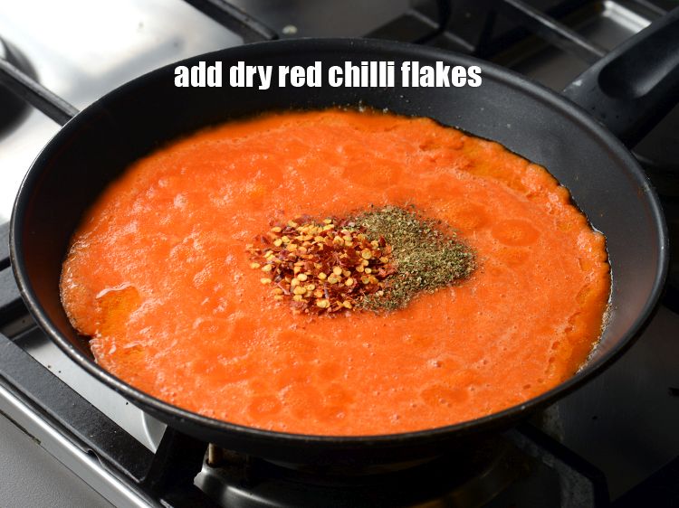 Step 22 – Add 1&frac12; tsp&nbsp;<a href="https://www.tarladalal.com/glossary-dry-red-chilli-flakes-paprika-338i">dry red chilli flakes (paprika)</a>.