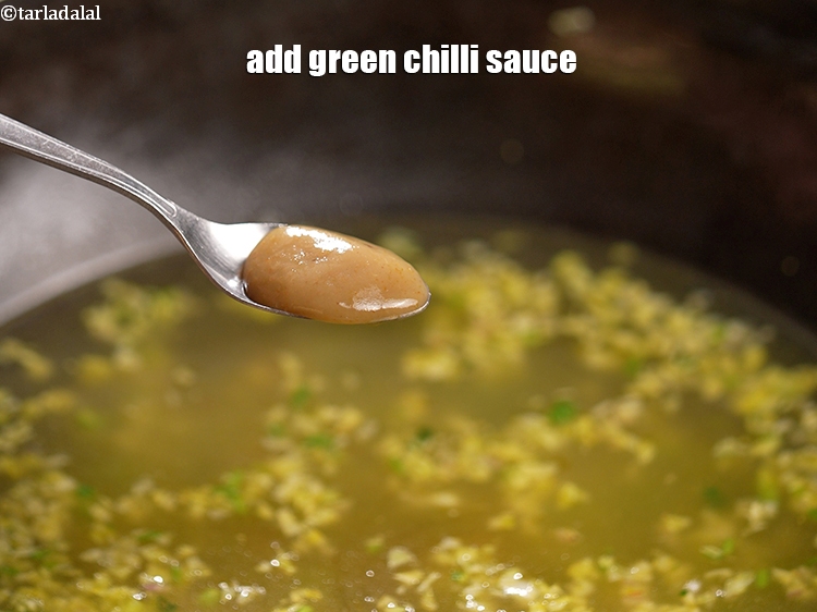 Step 20 – Add 1 tsp <a href="https://www.tarladalal.com/glossary-green-chilli-sauce-hara-chilli-sauce-1208i">green chilli sauce</a>.