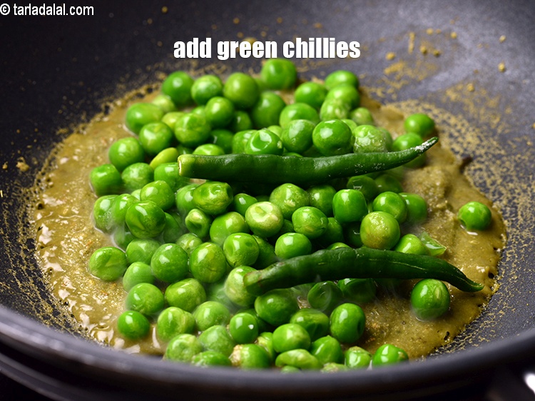 Step 19 – Add 2 slit green chillies.&nbsp;