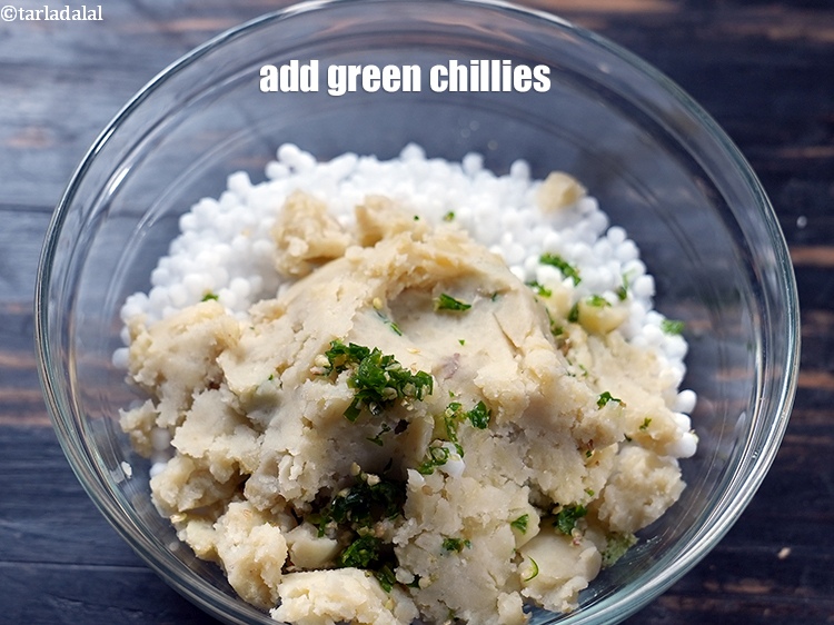 Step 20 – Add 1 tbsp finely <a href="https://www.tarladalal.com/glossary-chopped-green-chilli-820i">chopped green chillies</a>.