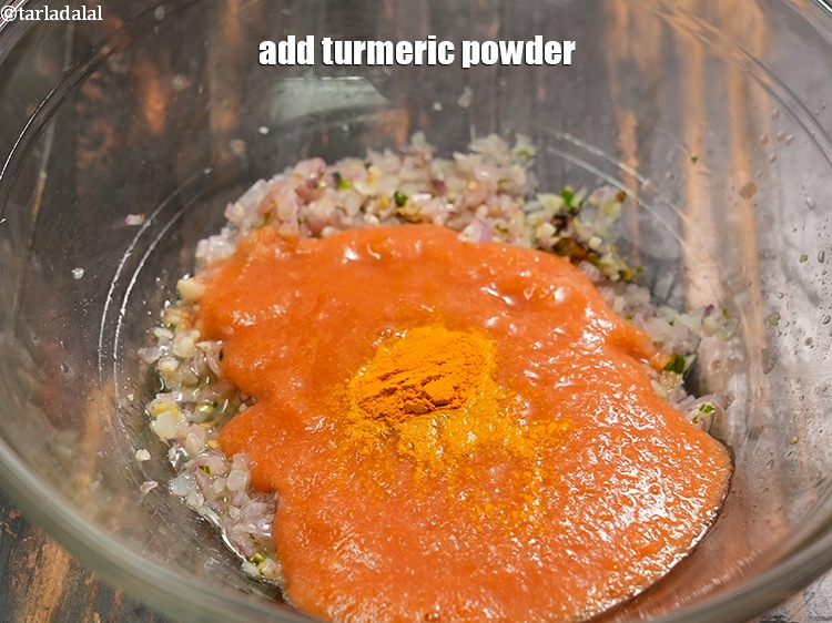Step 19 – Add &frac12; tsp <a href="https://www.tarladalal.com/glossary-turmeric-powder-haldi-645i">turmeric powder (haldi)</a>.&nbsp;