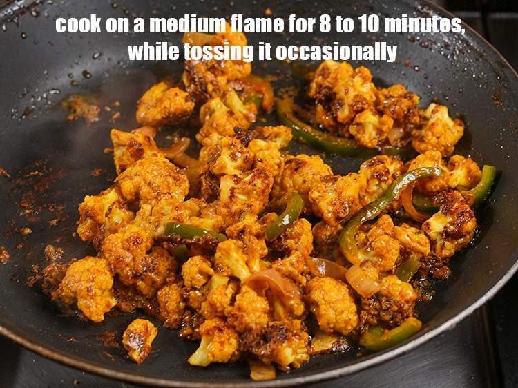Step 20 – Cook on a medium flame for 8 to 10 minutes, while tossing it occasionally.