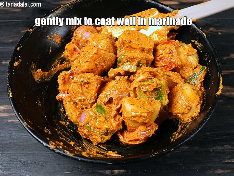 Step 21 – Gently mix to coat them well in the marinade.