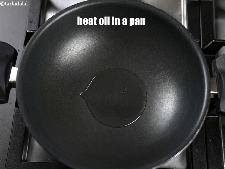 Step 20 – Heat 2 tsp oil in a deep non-stick pan.