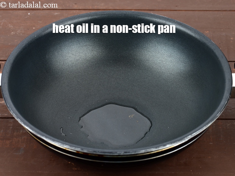 Step 21 – Heat 2 tsp oil in a non-stick kadhai.