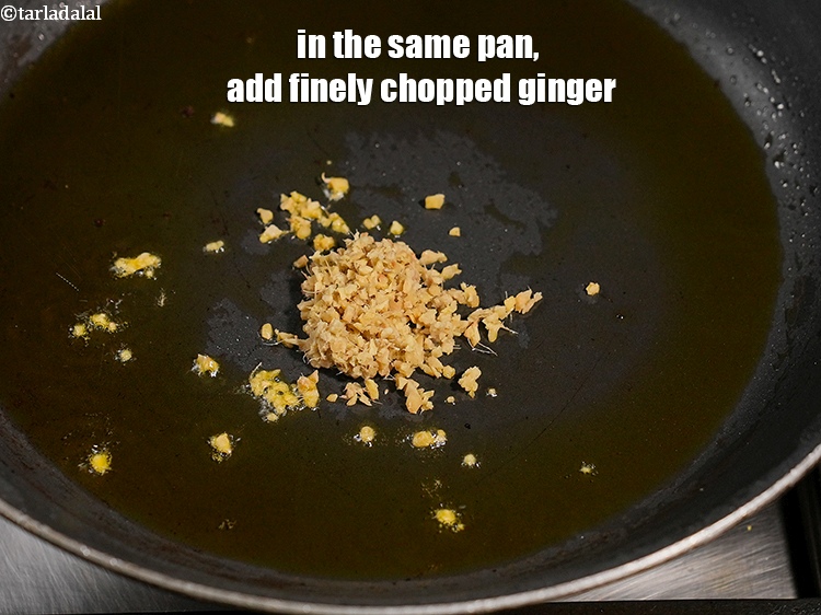 Step 20 – In the same pan, add 2 tsp finely <a href="https://www.tarladalal.com/glossary-chopped-ginger-786i">chopped ginger (adrak)</a>.&nbsp;