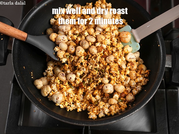 Step 20 – Mix well and dry roast them on slow flame for 2 minutes so the masalas …