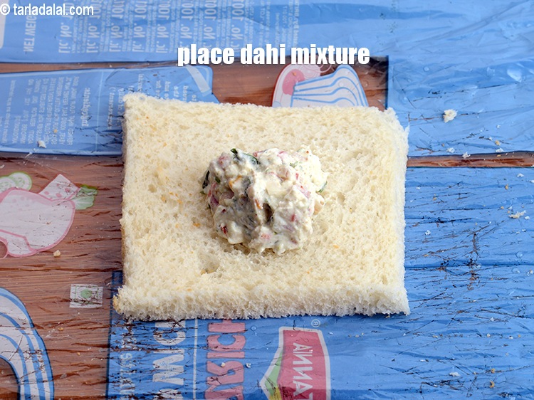 Step 20 – Place 1&nbsp;tbsp of dahi mixture.