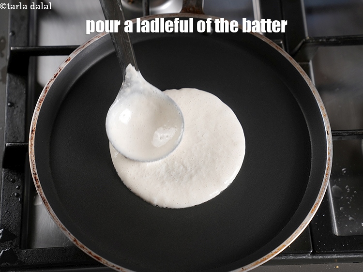 Step 20 – Pour a ladleful of the batter over it.