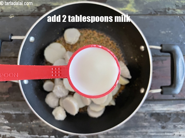 Step 31 – Add&nbsp;<meta charset="UTF-8" />2 tbsp&nbsp;<a href="glossary-milk-doodh-full-cream-milk-514i">milk</a>.