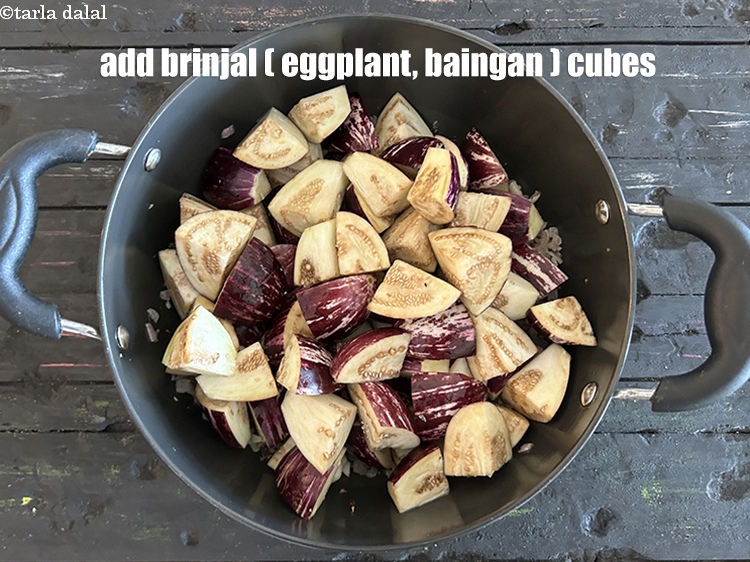 Step 21 – Add&nbsp;<meta charset="UTF-8" />4 cups&nbsp;<a href="glossary-brinjal-cubes-132i">brinjal (baingan / eggplant) cubes</a>.