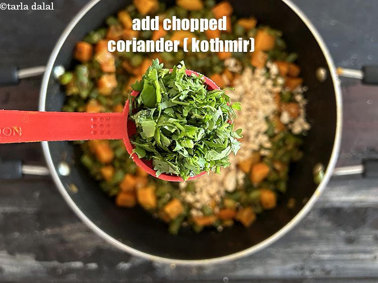 Step 22 – Add <strong>1 tbsp chopped coriander</strong>.