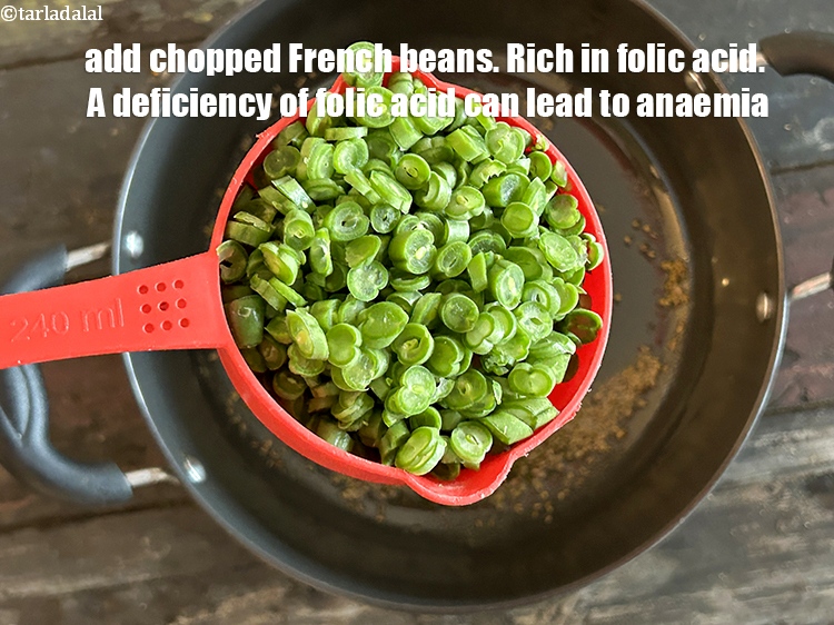 Step 20 – <html><head></head><body><p>Add&nbsp;2 cups&nbsp;<a href="glossary-chopped-french-beans-797i">chopped french beans</a>.&nbsp; <a href="https://www.tarladalal.com/recipes-using-french-beans-196">French Beans</a>&nbsp;are&nbsp;rich in&nbsp;<a href="https://www.tarladalal.com/recipes-for-Pregnancy-Folic-Acid-Rich-447">folic acid</a>. &nbsp;A deficiency of folic …