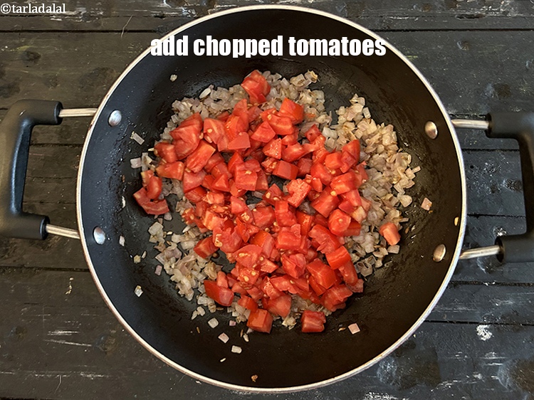 Step 26 – Add&nbsp;<meta charset="UTF-8" />1 cup&nbsp;<a href="glossary-chopped-tomatoes-779i">chopped tomatoes</a>.