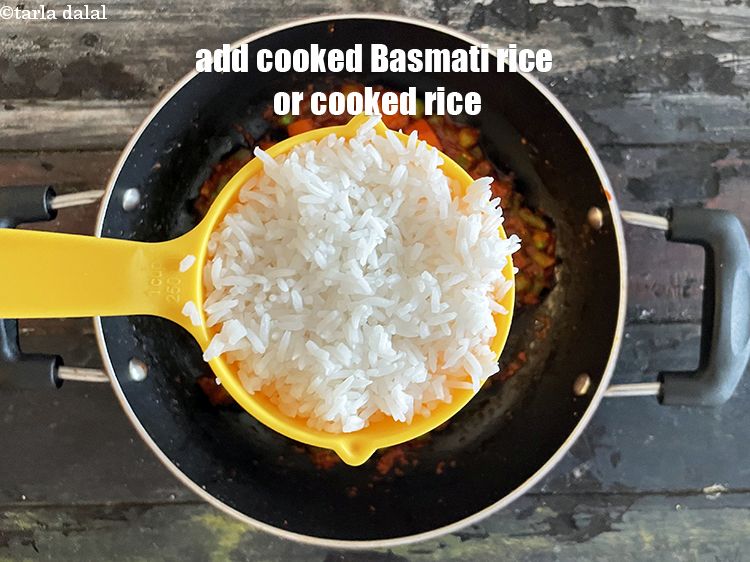 Step 20 – Add&nbsp;<meta charset="UTF-8" />3 cups cooked Basmati rice or&nbsp;<a href="cooked-rice-32639r">cooked rice</a>.