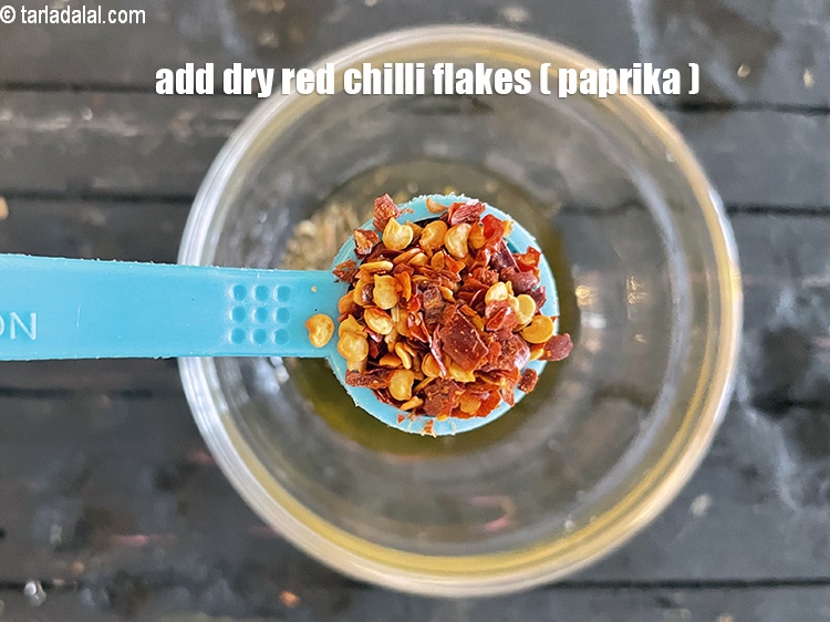 Step 20 – Add&nbsp;<meta charset="UTF-8" />1/2 tsp&nbsp;<a href="glossary-dry-red-chilli-flakes-paprika-338i">dry red chilli flakes (paprika)</a>.
