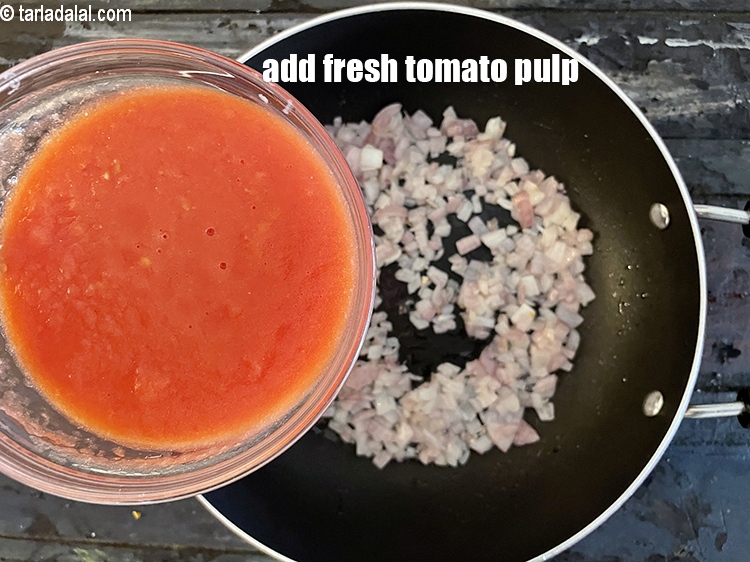 Step 27 – <p>Add&nbsp;1 cup&nbsp;fresh&nbsp;<a href="glossary-tomato-pulp-tamatar-ka-pulp-1039i">tomato pulp</a>. See <a href="https://www.tarladalal.com/fresh-tomato-pulp-homemade-tomato-pulp-38652r"><strong>how to make fresh tomato pulp recipe</strong></a>.</p>