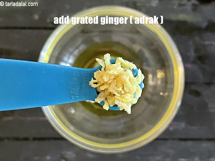 Step 20 – Add&nbsp;<meta charset="UTF-8" />1/4 tsp&nbsp;<a href="glossary-grated-ginger-943i">grated ginger (adrak)</a>.