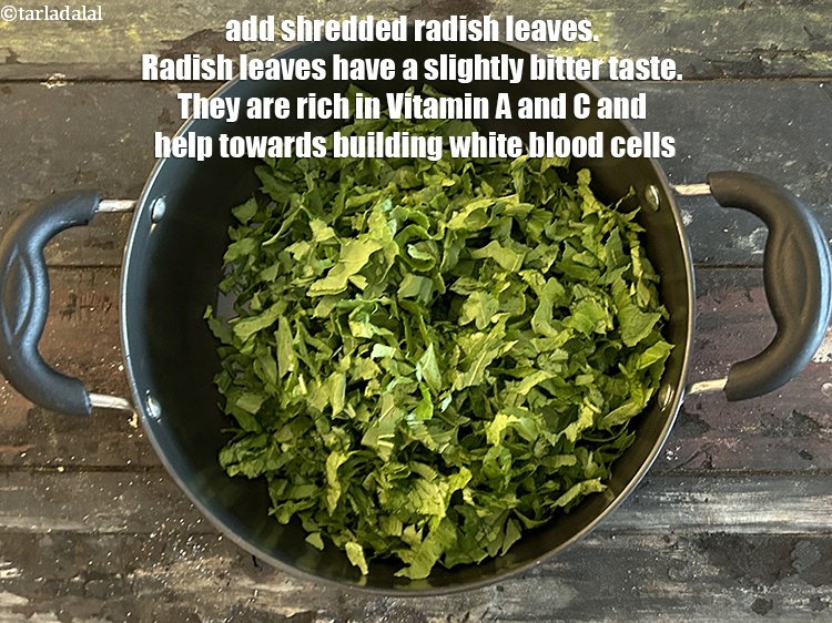 Step 31 – Add&nbsp;<meta charset="UTF-8" />2 cups&nbsp;shredded&nbsp;<a href="glossary-radish-leaves-mooli-ke-patte-mooli-ka-patta-503i">radish leaves (mooli ke patte)</a>.&nbsp;Radish leaves have a unique peppery and …