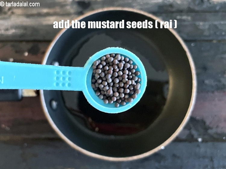Step 20 – Add&nbsp;<meta charset="UTF-8" />1/2 tsp&nbsp;<a href="glossary-mustard-seeds-sarson-rai-sarson-ke-beej-525i">mustard seeds ( rai / sarson)</a>.