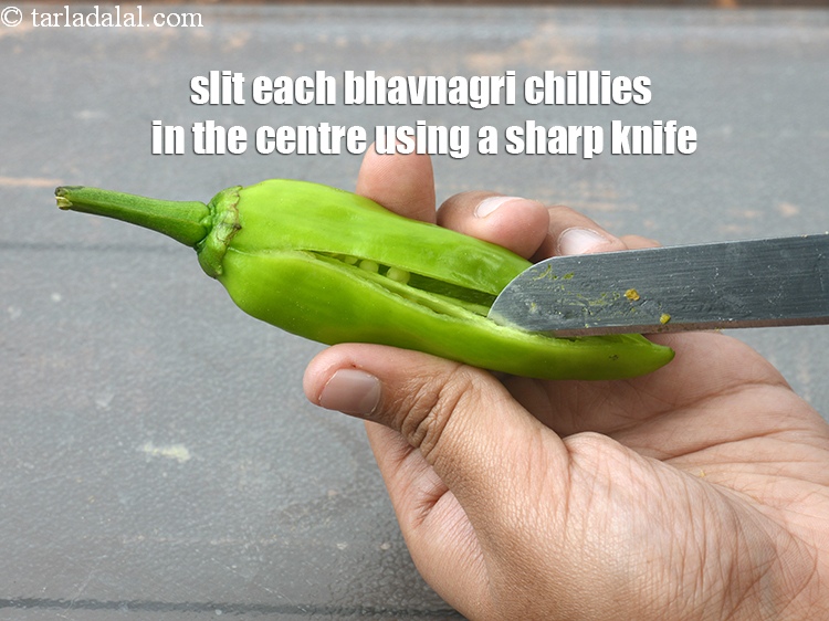 Step 22 – Slit each bhavnagri chillies in the centre using a sharp knife.