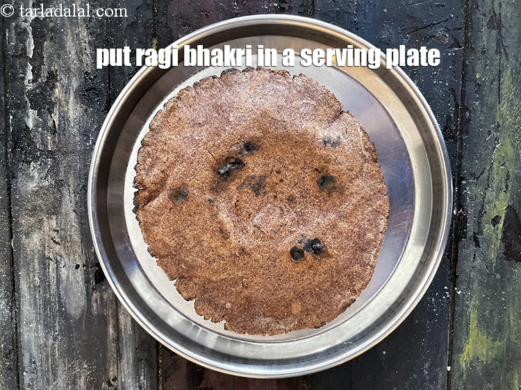 Step 21 – Put ragi bhakri in a serving plate.