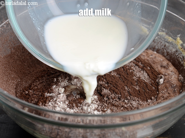 Step 20 – Add &frac34; cup <a href="https://www.tarladalal.com/glossary-milk-doodh-full-cream-milk-514i">milk</a>.
