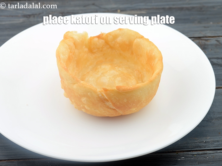 Step 22 – Just before serving, Place a katori on a serving plate.