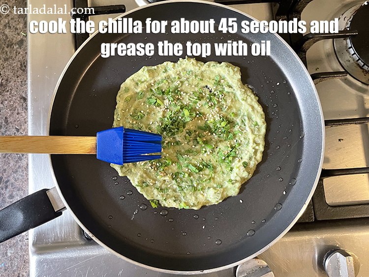 Step 31 – <meta charset="UTF-8" /> Cook the chilla for about 45 seconds.&nbsp;Cook on a medium flame till …