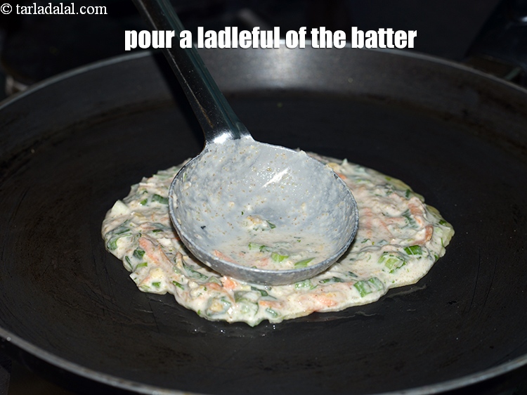 Step 19 – Pour a ladleful of the batter.