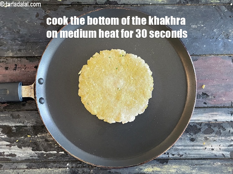 Step 20 – Cook the bottom of the khakhra on medium heat for 30 seconds.
